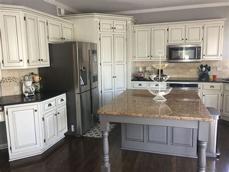 steel grey granite on white cabinets|black and white granite cabinets.